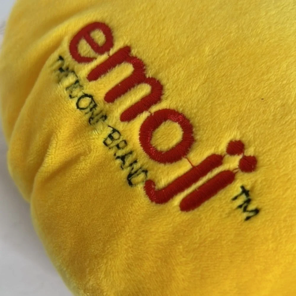 THE ICONIC BRAND EMOJI SMILE PILLOW WITH SUNGLASSES